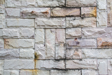 Abstract weathered seamless texture stained old stucco light gray and aged paint white brick wall background in rural room, grungy rusty blocks of stonework technology. High resolution white brick