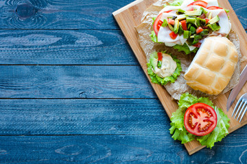 Fresh and tasty sandwich with ham and vegetables