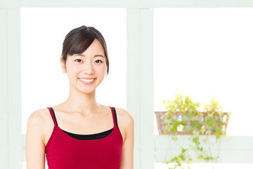 portrait of sporty asian woman in the room