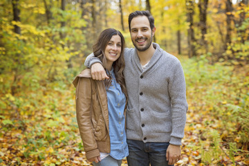 Fototapeta premium Nice couple having fun in autumn park