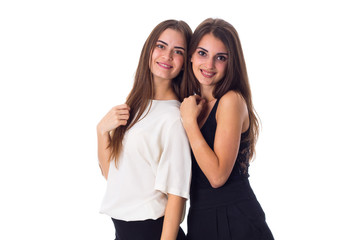 Two young woman embracing