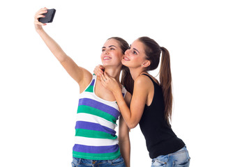 Fototapeta na wymiar Two young women making selfie