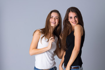 Two young women smiling 