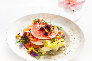 heirloom tomato salad with johnny jump up flowerrs
