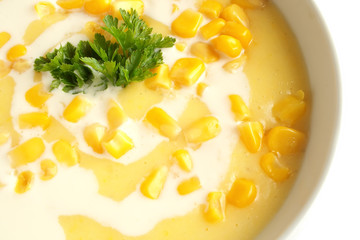 Bowl of sweet corn soup isolated on white background