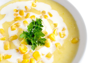 Naklejka na ściany i meble Bowl of sweet corn soup isolated on white background 