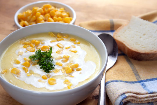 
Sweet corn soup in a white bowl
