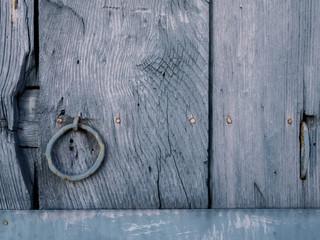 Detail of an old painted wooden gate