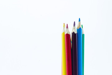 Colour pencils isolated on white background close up