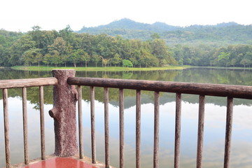 A view point from wooden balcony with lake and forest background in morning day,chet khot - pong...