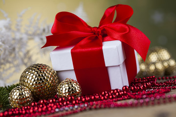 Christmas balls, Gift box with red ribbon, Holiday background