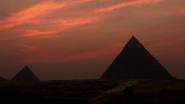 Zoon Out - Time Lapse of Sunset - The Great Pyramids of Giza - Egypt   