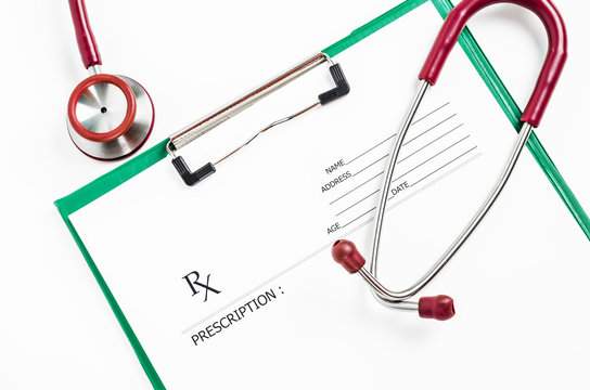 prescription form with stethoscope.