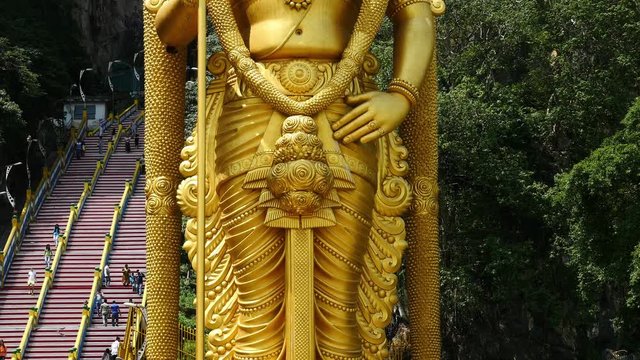 Pan Up of Giant Buddha outside Batu Caves -  Kuala Lumpur Malaysia