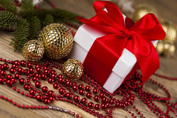 Christmas balls, Gift box with red ribbon, Holiday background