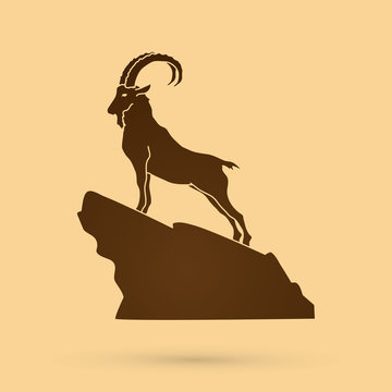 Ibex standing on the cliff graphic vector.