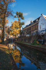 Fototapeta na wymiar Nieuwegracht with its arched bridges in the old town of Utrecht.