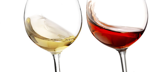 Red and white wine splash with white background, close up