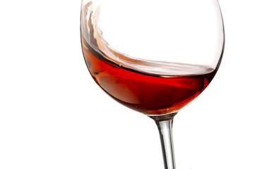 Red wine splash with white background, close up