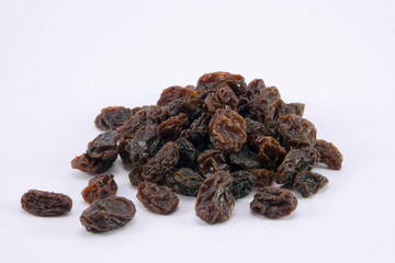 Dried raisins on a white background