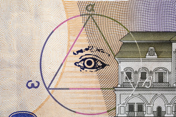 Masonic symbol image - eyes and a triangle on the banknotes