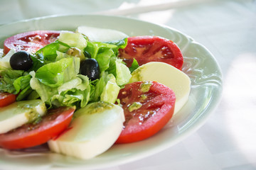 Caprese salad on white