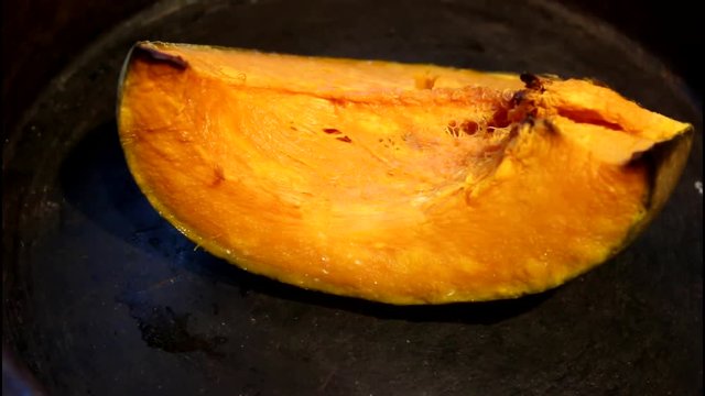 Roasted pumpkin in plate - top view
