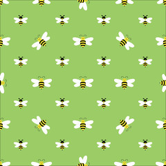 Seamless pattern with flying bees on a green background