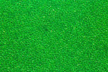 Fototapeta premium texture of green polymeric foam material