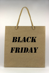 black friday brown paper bag with handles, front view, on white