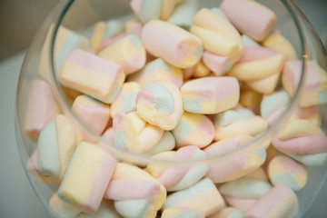 sweet marshmallow in a container of glass