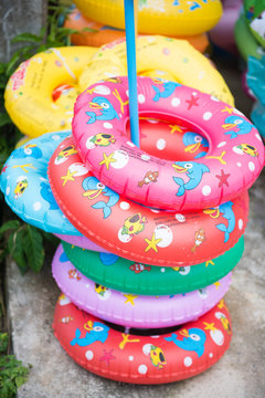 colorful swim ring for kids at pool