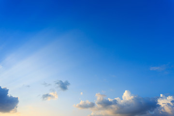 light rays on clear blue sky background