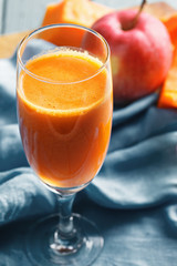 Pumpkin and apple juice closeup