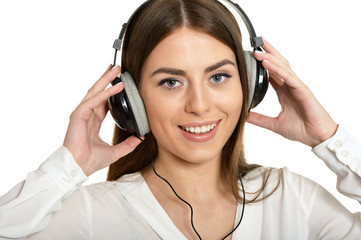 Fototapeta premium Girl listening music in headphones