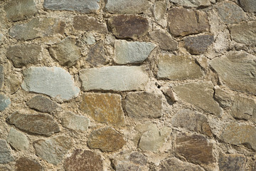 A fragment of a stone retaining wall