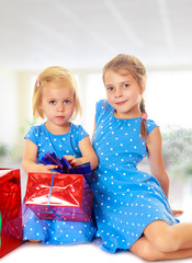 Two sisters with a gift