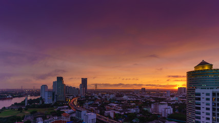 Fototapeta na wymiar Beautiful sunset in Bangkok viewingThe Bhumbipol Bridge, Rama III road and Chao Phraya River , Thailand