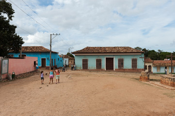 Fototapeta na wymiar Residential street with houses on Trinidad, Cuba