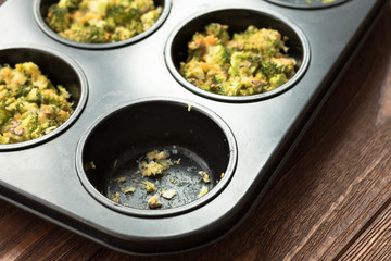 Healthy lifestyle and cooking concept - broccoli cheese bites