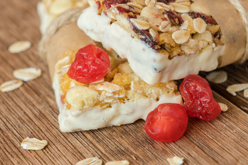 Sweet bars with a chocolate, rise and cranberry