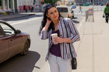 Fototapeta premium Girl walking on the city