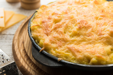 Homemade baked macaroni with parmesan cheese