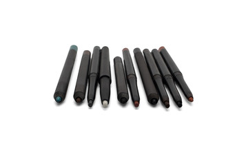 Eye liner and lip pencil. Black cosmetic pencil isolated on white background