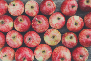 Sweet fresh ripe red apple harvest background