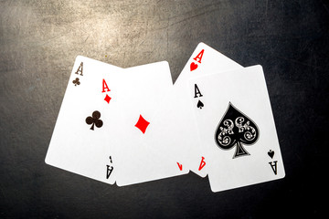 poker chips and cards on black background