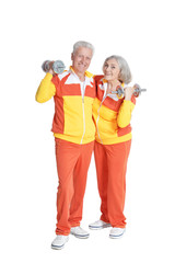 Senior Couple Exercising with dumbbells