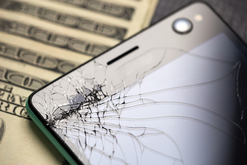 broken phone and the savings to buy a new smartphone model..