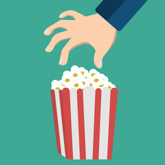 Hand and popcorn. Flat design style icon. Vector illustration