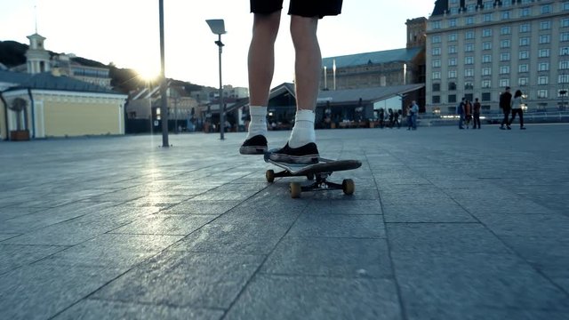 Skateboarder in motion. One foot on skateboard. Never doubt yourself. Discover your talents.